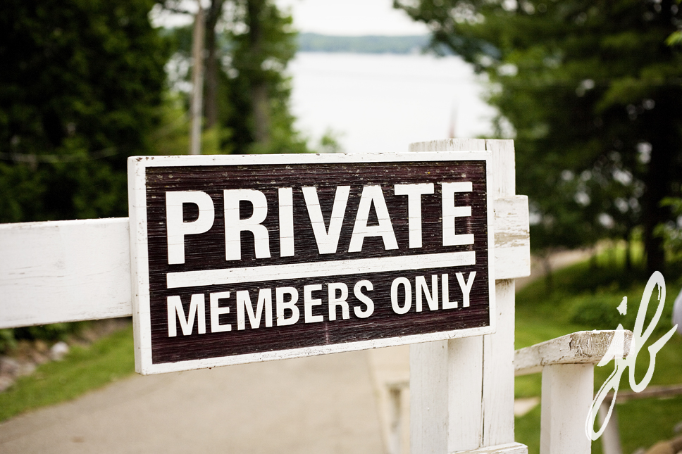 lake geneva sign on gate - Private members only